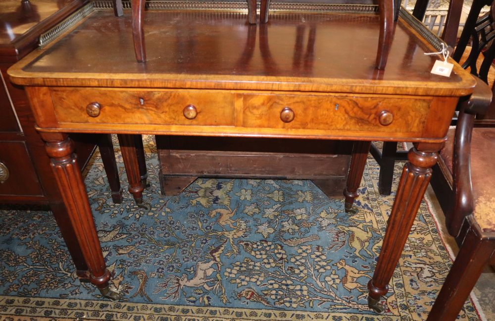 A Victorian Gillows-style walnut two drawer writing table, W.92cm, D.51cm, H.74cm
